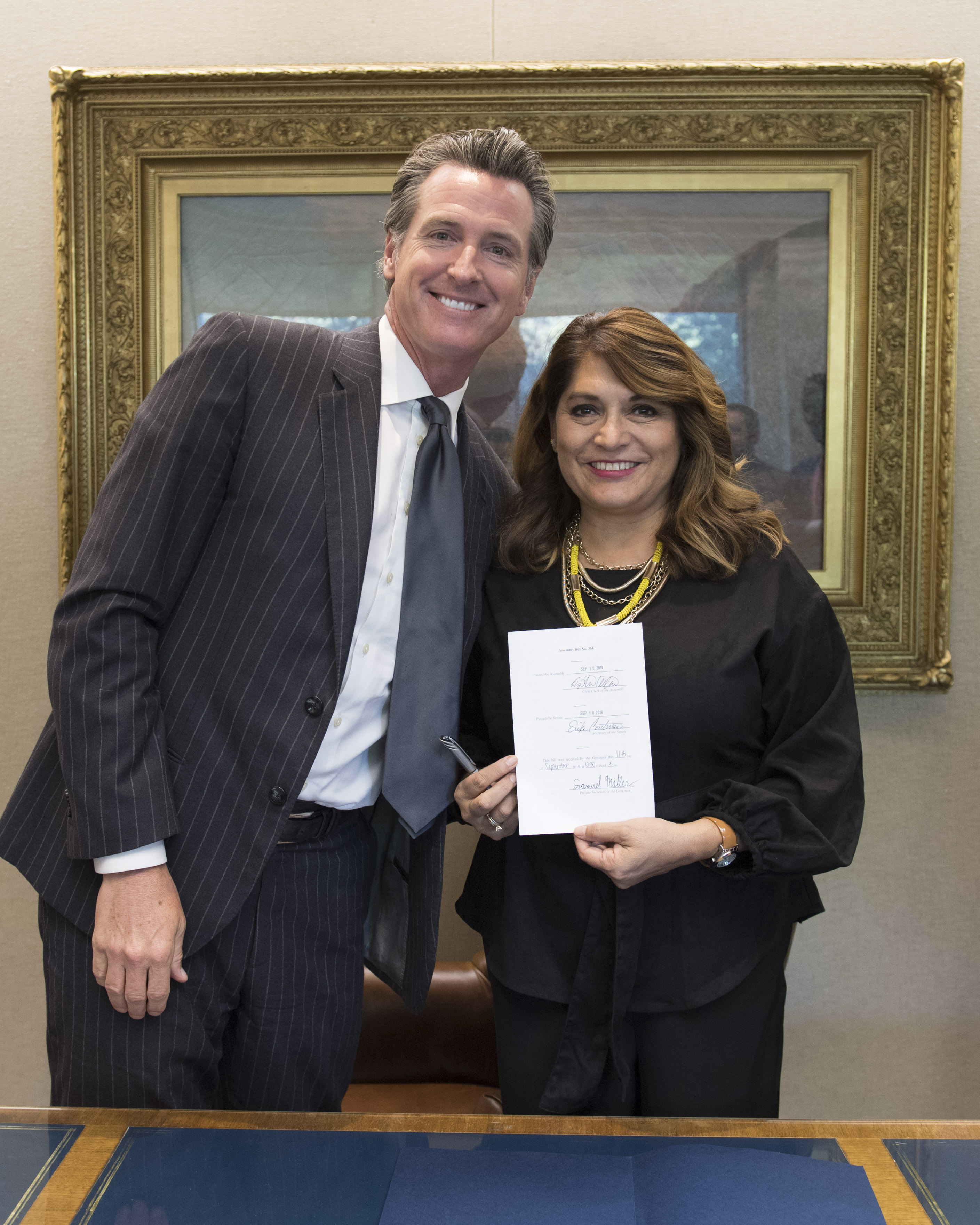 AB 368 is signed into law as Governor Gavin Newsom and Sharon stand together in celebration