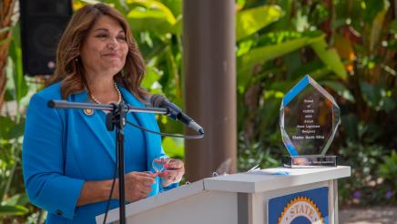 Assemblywoman Sharon Quirk-Silva speaks to honorees in attendance