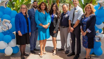 Assemblywoman Sharon Quirk-Silva stands with her District Office Staff