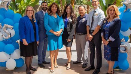 Assemblywoman Sharon Quirk-Silva stands with her District Office Staff