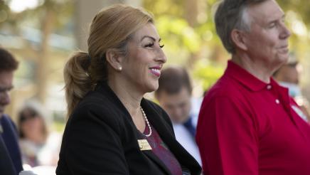 Alicia De La Luz listens on and celebrates with CSUF